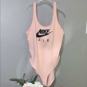 Pink Nike bodysuit
